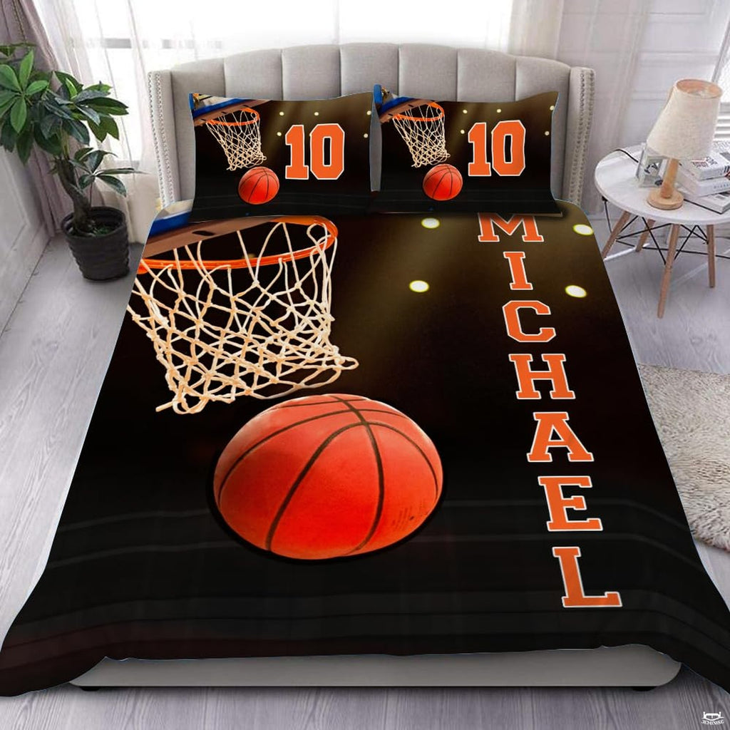 Basketball hoop spotlight bedding featuring orange ball dropping through net with radiant arena light bokeh