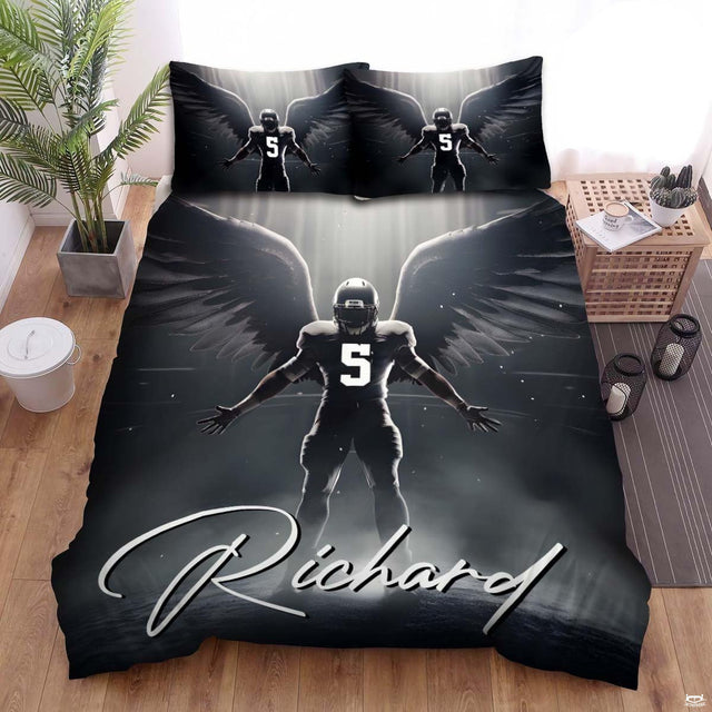 Dramatic wings football player bedding set featuring athletic graphic art with silver light beams in bedroom.