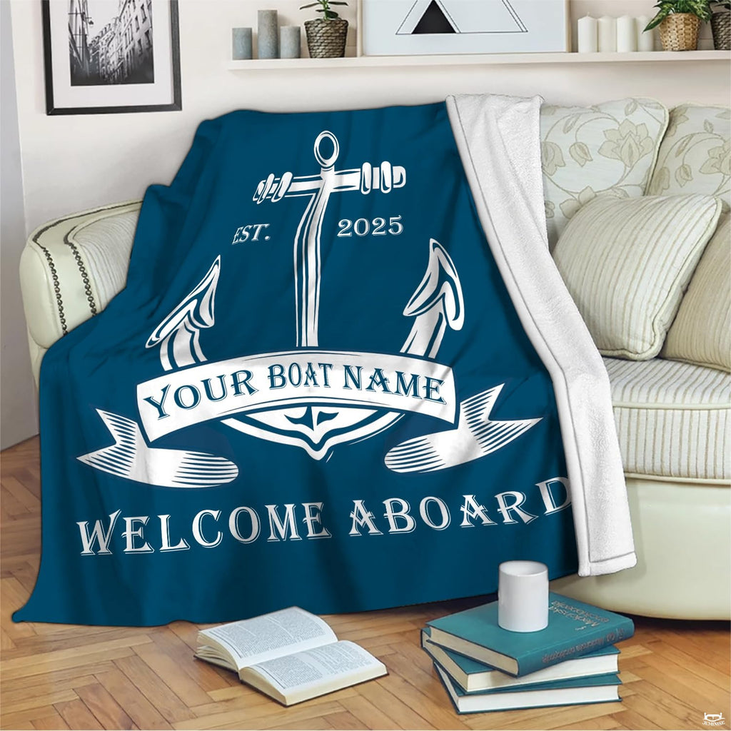 Detailed view of the heraldic banner ribbon and nautical rope artwork on coastal blue bedding.