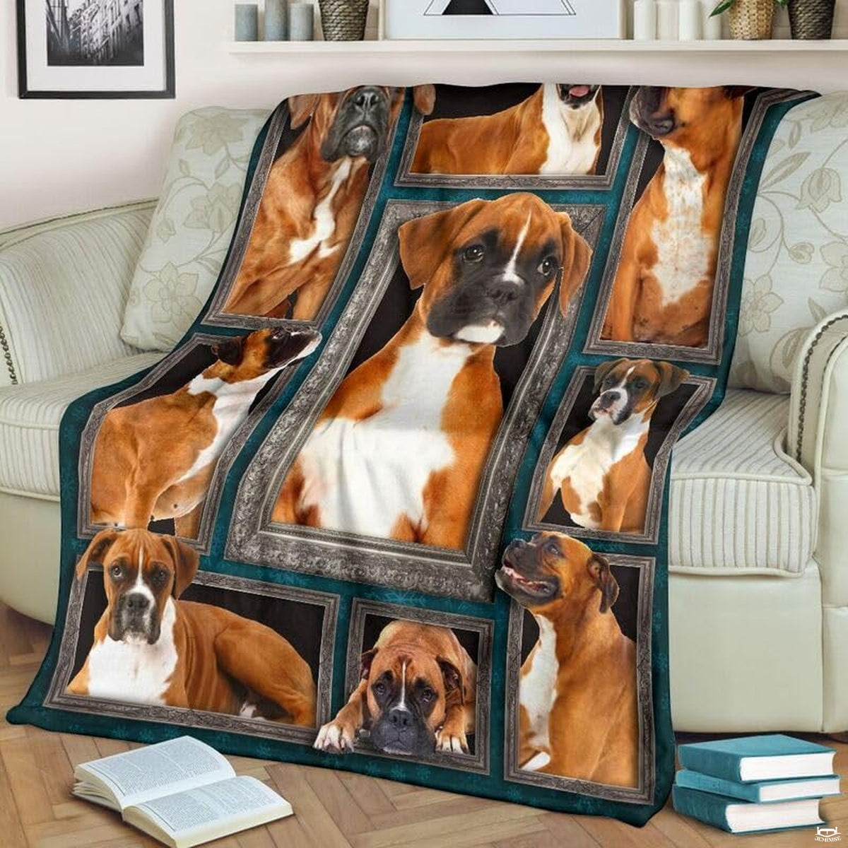 Fawn Boxer Dog throw blanket styled across a living room sofa near stacked books and a cup.
