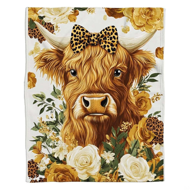 Close-up view of illustrated brown highland cow head with leopard bow tie framed by golden yellow and white flowers.