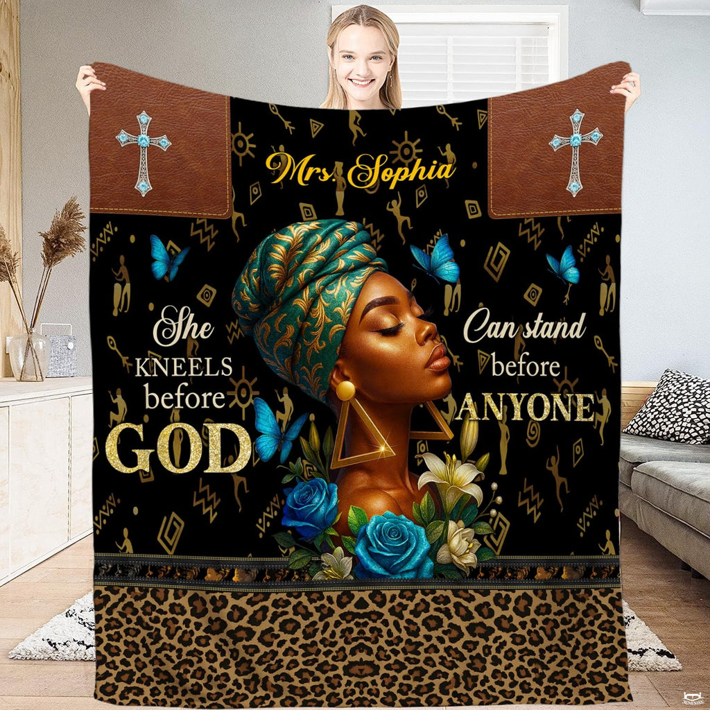 Faith art blanket featuring a regal woman in ornate headwrap with cross emblems and blue flowers.