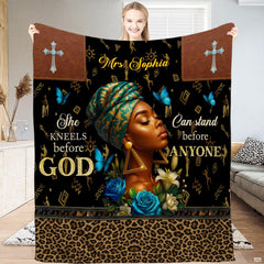 Faith art blanket featuring a regal woman in ornate headwrap with cross emblems and blue flowers.