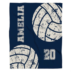 Vintage volleyball bedding set displaying distressed white graphics and jersey numbers on navy.