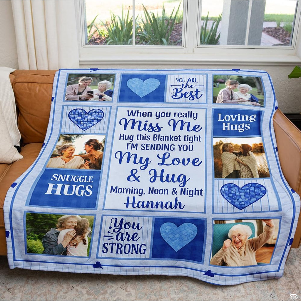 Folded family memory throw blanket showcasing crisp periwinkle blue borders and heart motif