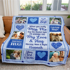 Folded family memory throw blanket showcasing crisp periwinkle blue borders and heart motif