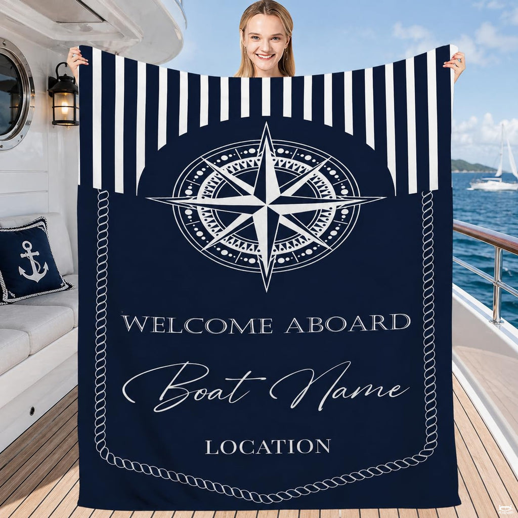 Navy coastal bedspread set featuring an eight-pointed compass rose and cabana stripes.