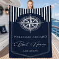 Navy coastal bedspread set featuring an eight-pointed compass rose and cabana stripes.