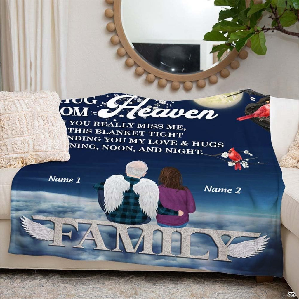 Peaceful living room setting featuring memorial angel cardinal throw blanket on couch