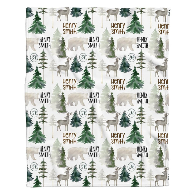 Forest nursery bedding set featuring watercolor pine trees, deer, and bear silhouettes on white.