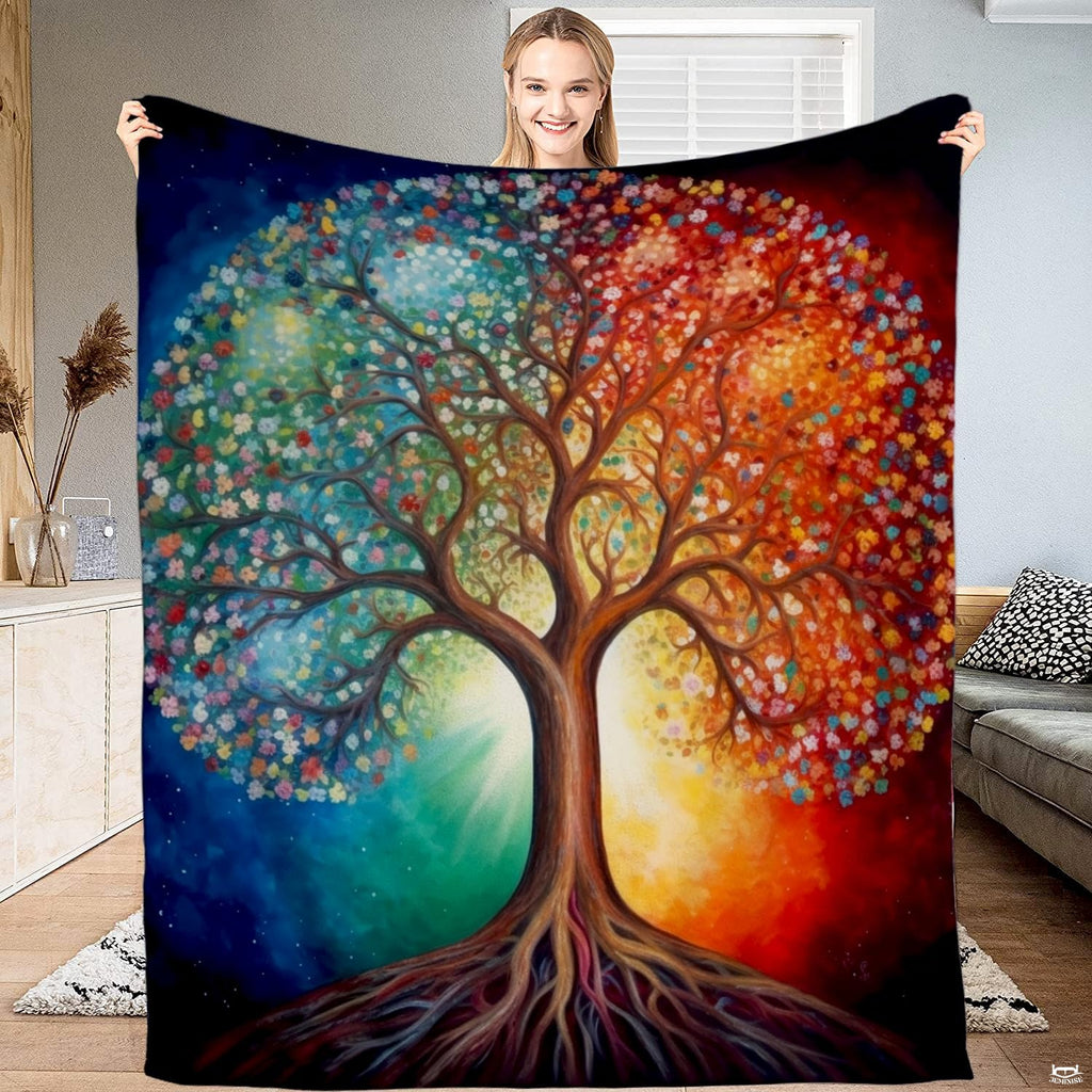 Four Seasons Tree of Life throw blanket displaying split cool blue and fiery red floral canopy