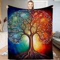 Four Seasons Tree of Life throw blanket displaying split cool blue and fiery red floral canopy