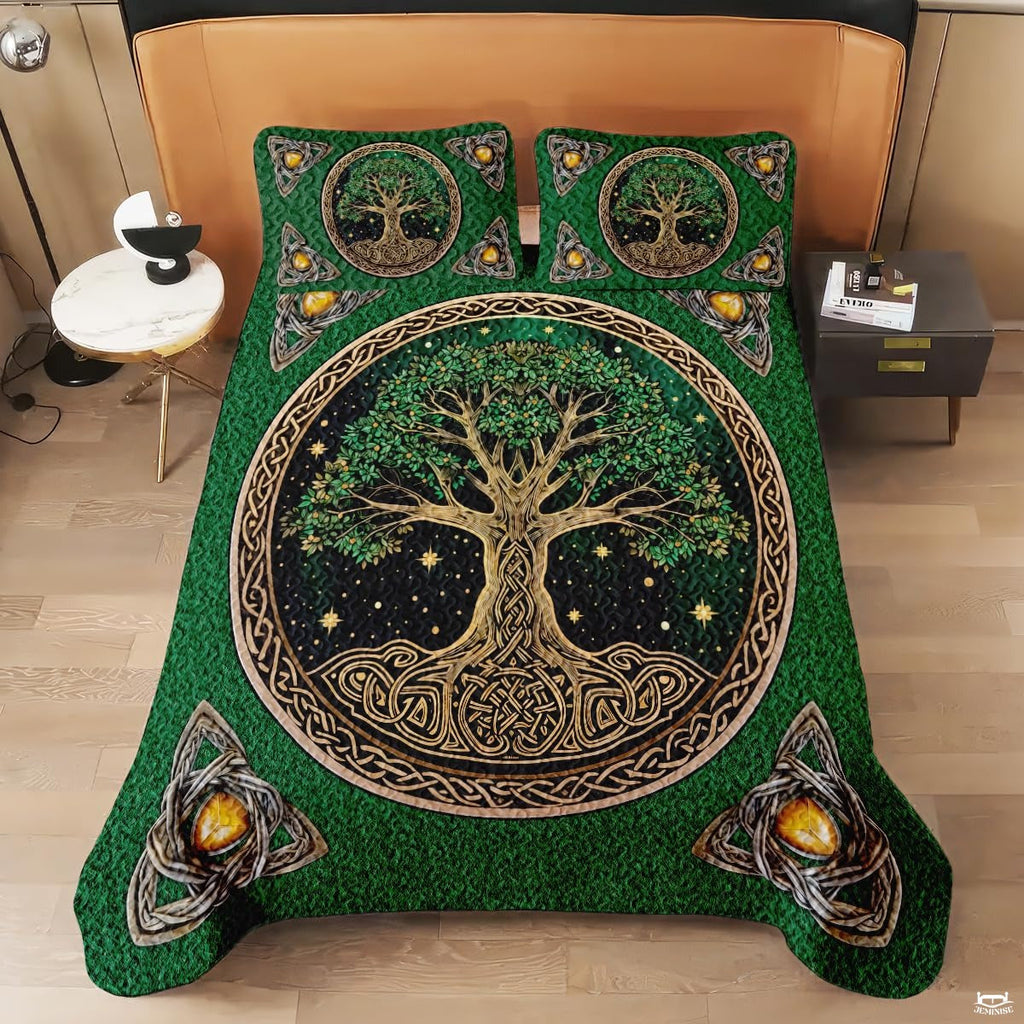 Detailed view of matching pillowcases featuring circular Celtic tree of life medallion on green ground.