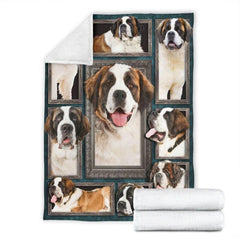 Folded corner and rolled layout of the Saint Bernard blanket showing the white reverse side.