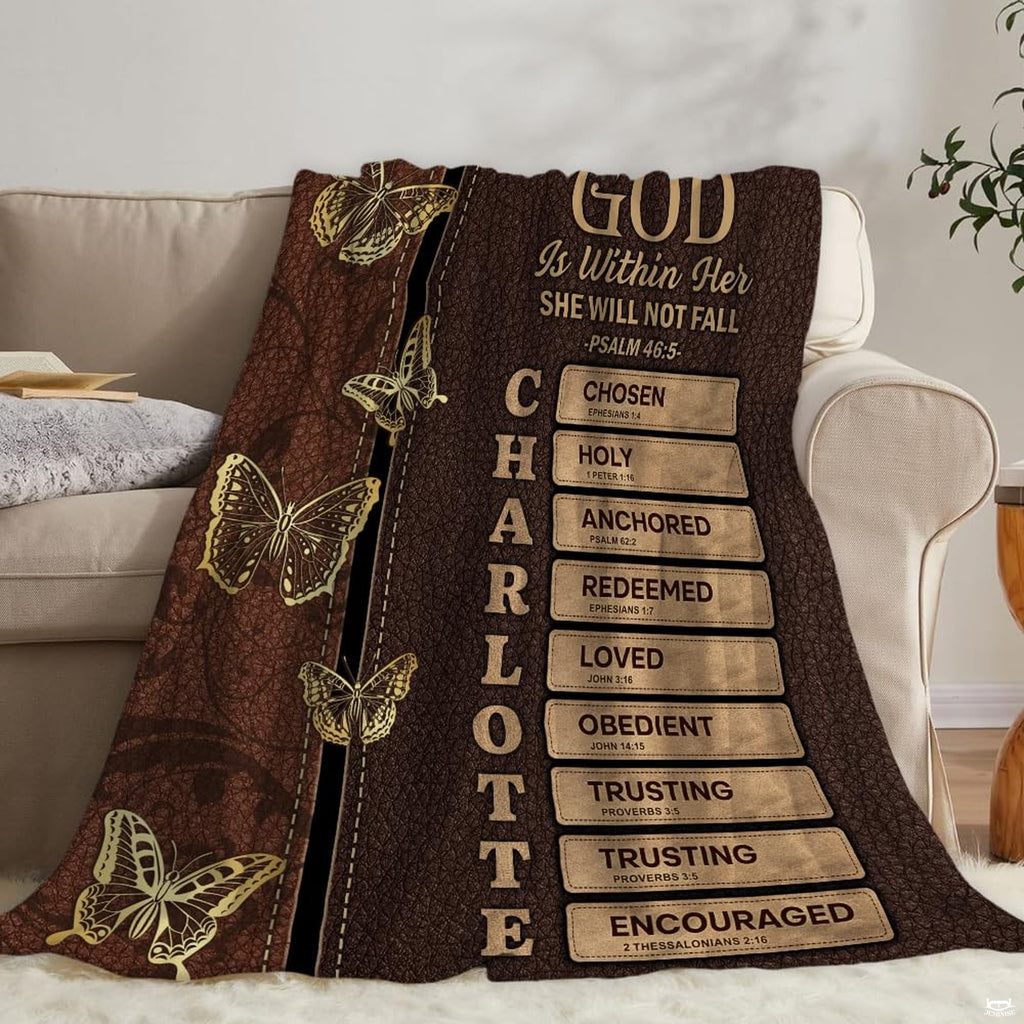 Artistic angle of brown faux thematic accent bedding set highlighting stitched badge plaques and decorative golden...