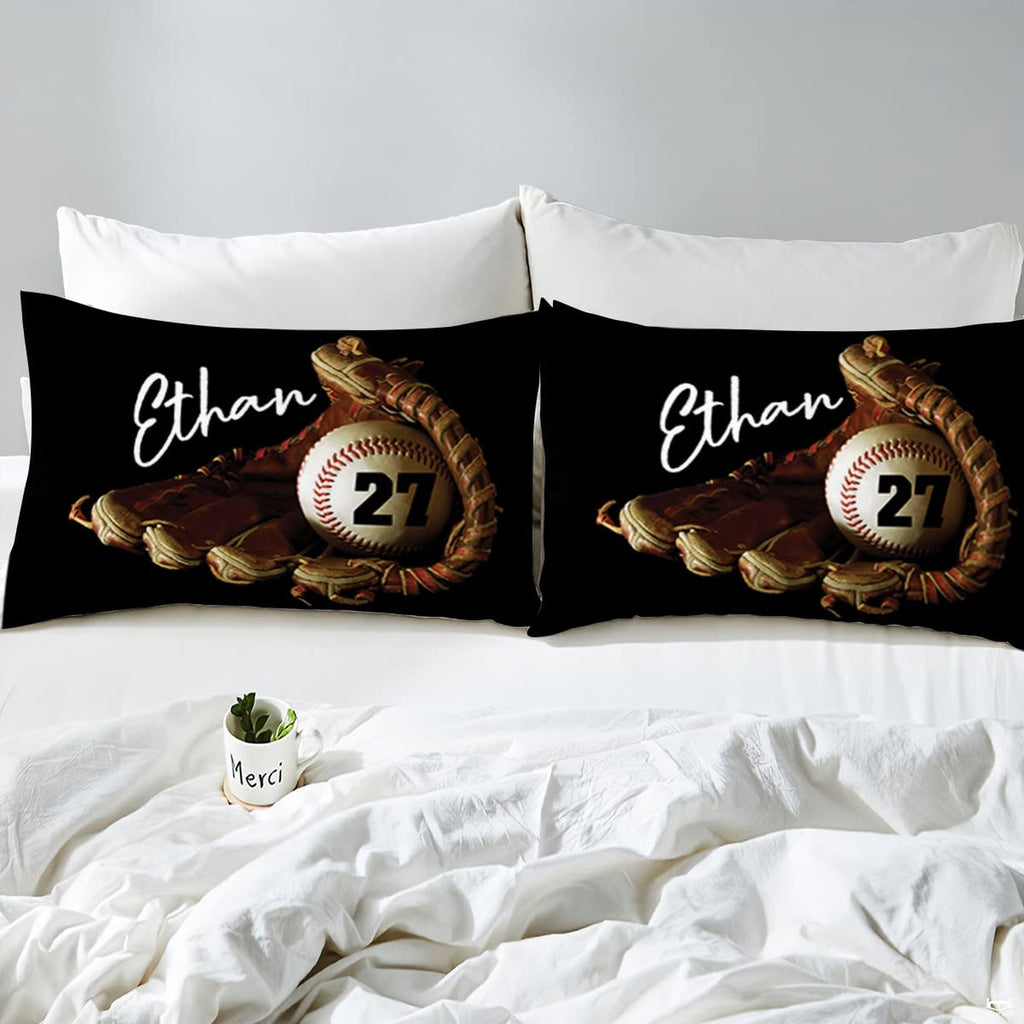 Overhead perspective of black baseball bedding arranged neatly across an athletic bedroom mattress