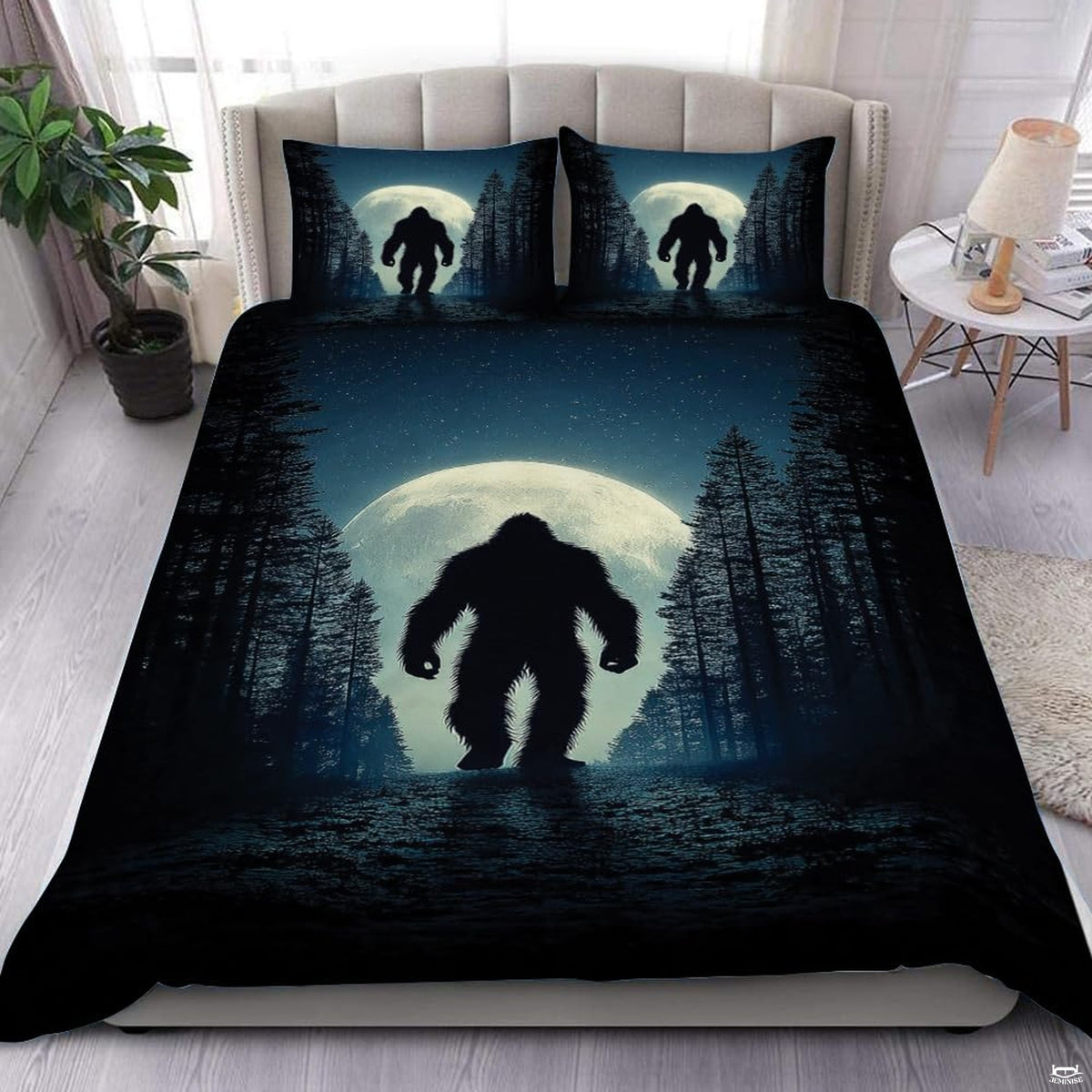 Sage moon bigfoot silhouette bedding set showing a cryptid sasquatch walking across cool slate and moonlit rings.