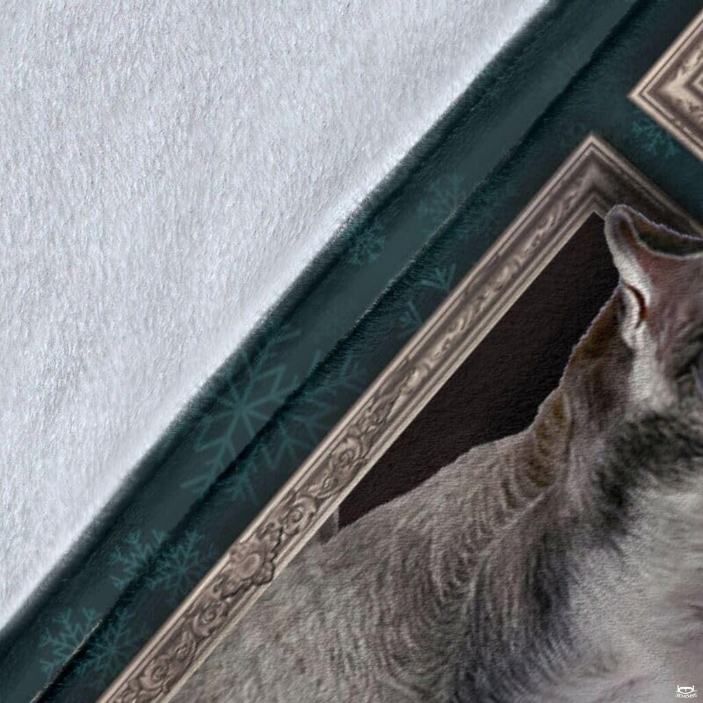 Close-up detail shot of the Miniature Schnauzer blanket showing edge detail and teal snowflake art.