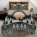 Rustic woodland deer bedding set featuring a stag silhouette in front of a striped pine forest sunset.