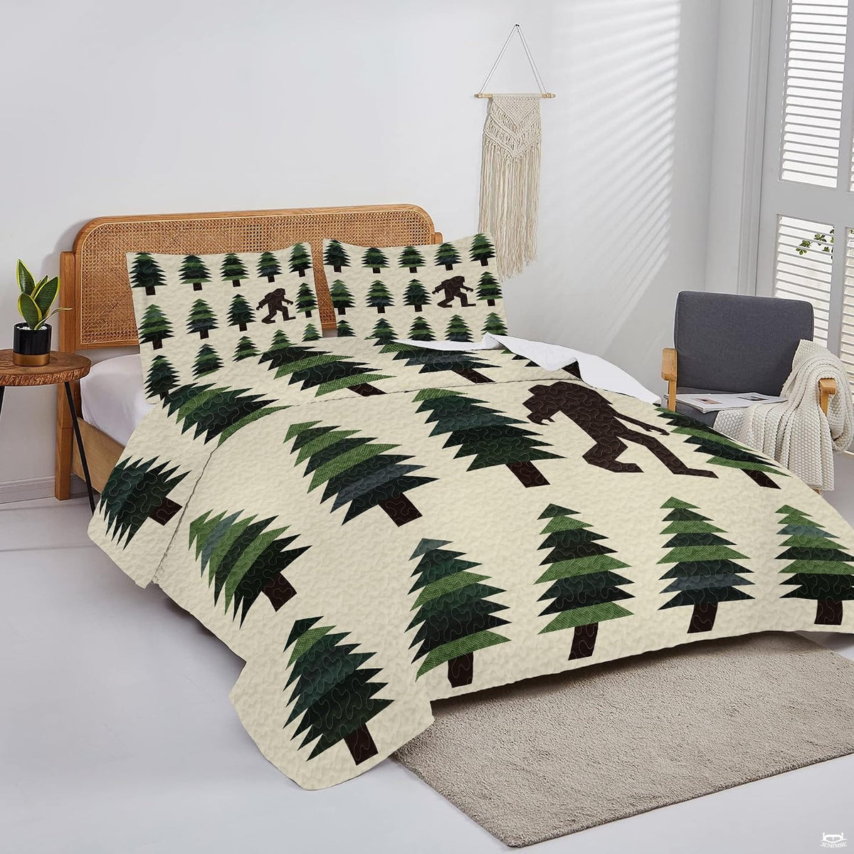 Overhead view of rustic Bigfoot bedding arranged neatly across a woodland cabin mattress