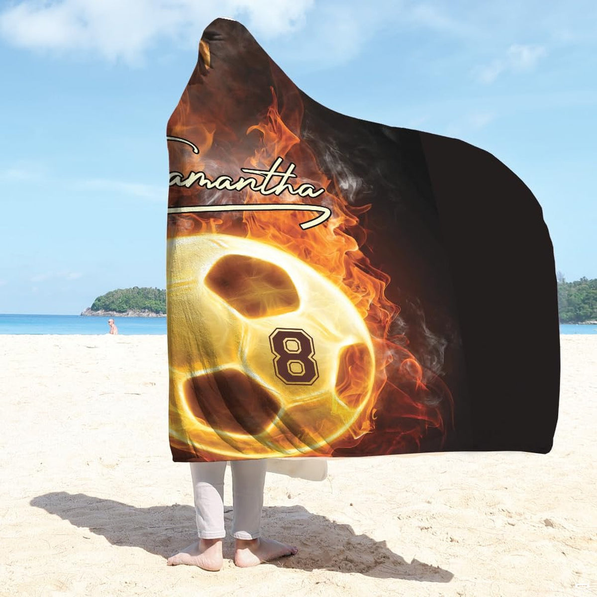 Close up view of plush white sherpa inner lining texture on the soccer sports blanket.