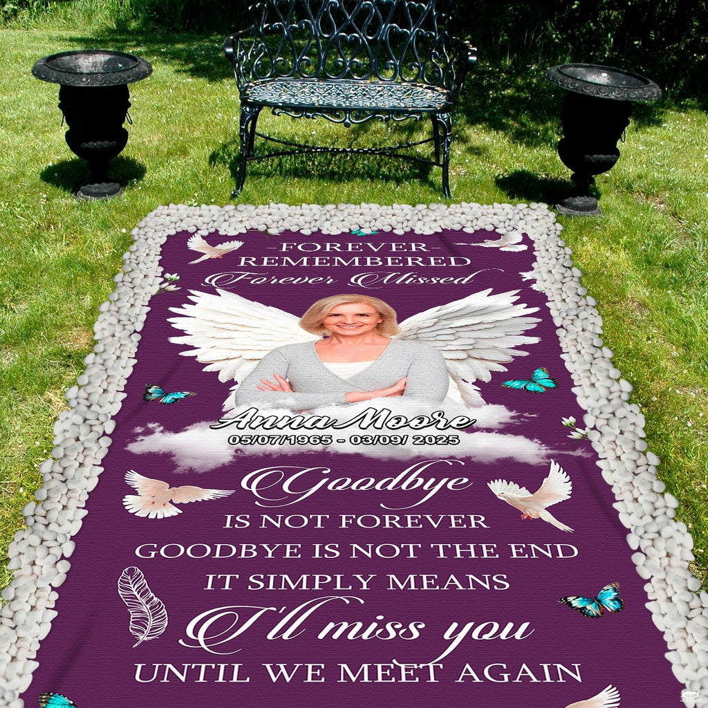 Purple memorial throw blanket laid out on outdoor grass near vintage garden park bench