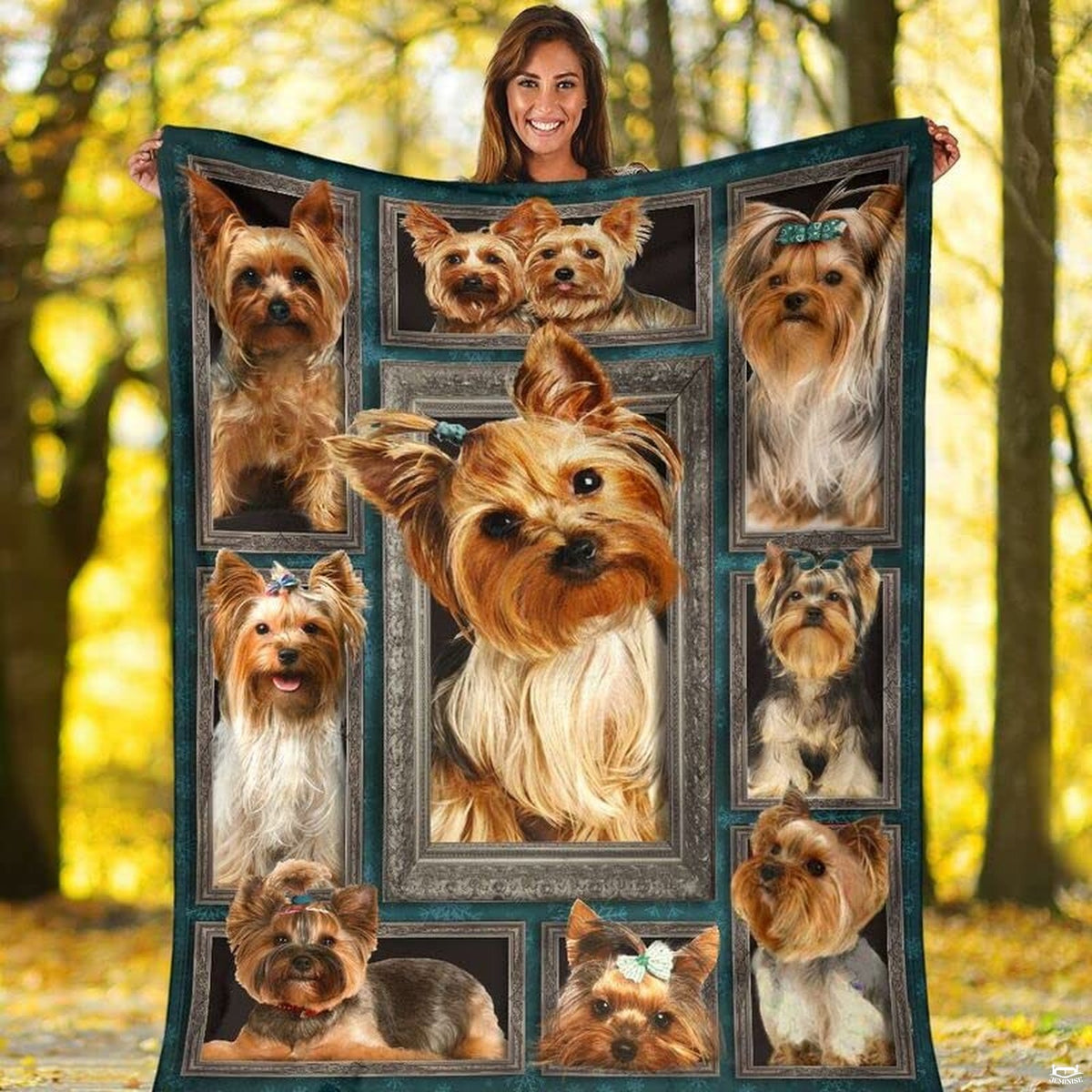 Folded canine graphic blanket highlighting antique silver frames and teal