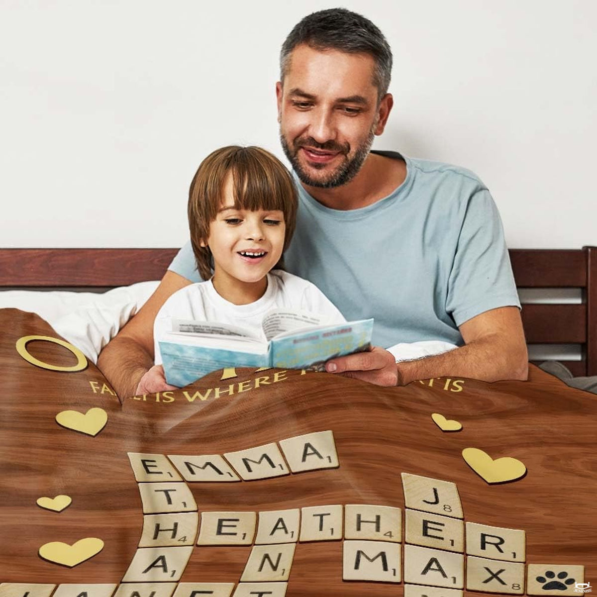 Close-up detail of wooden letter tiles and paw print tile against rustic woodgrain background.