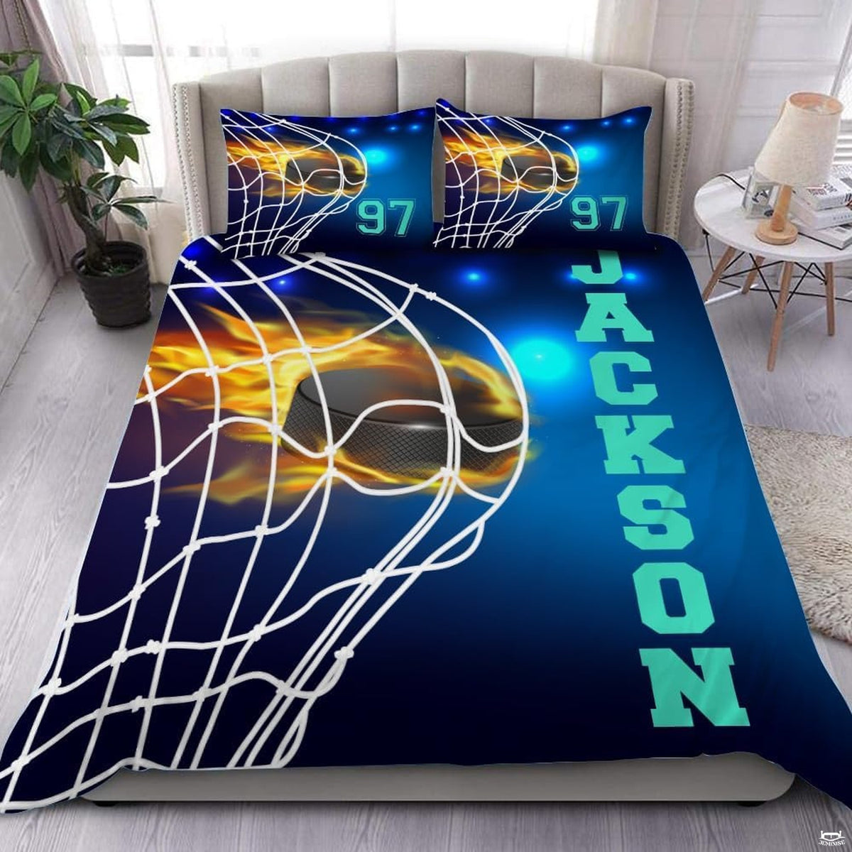 Fire and ice hockey puck sports bedding set featuring dynamic puck graphics, roaring flames, and cyan ice