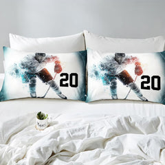 Side angle view of athletic winter sports bedding showing dove grey and slate silver tones on mattress
