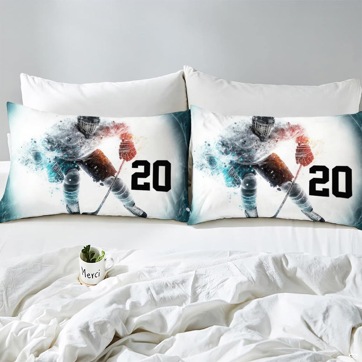 Side angle view of athletic winter sports bedding showing dove grey and slate silver tones on mattress