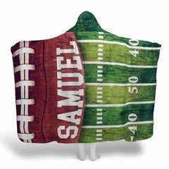 Rustic football field wood throw blanket featuring split design of wood grain ball and green yard lines