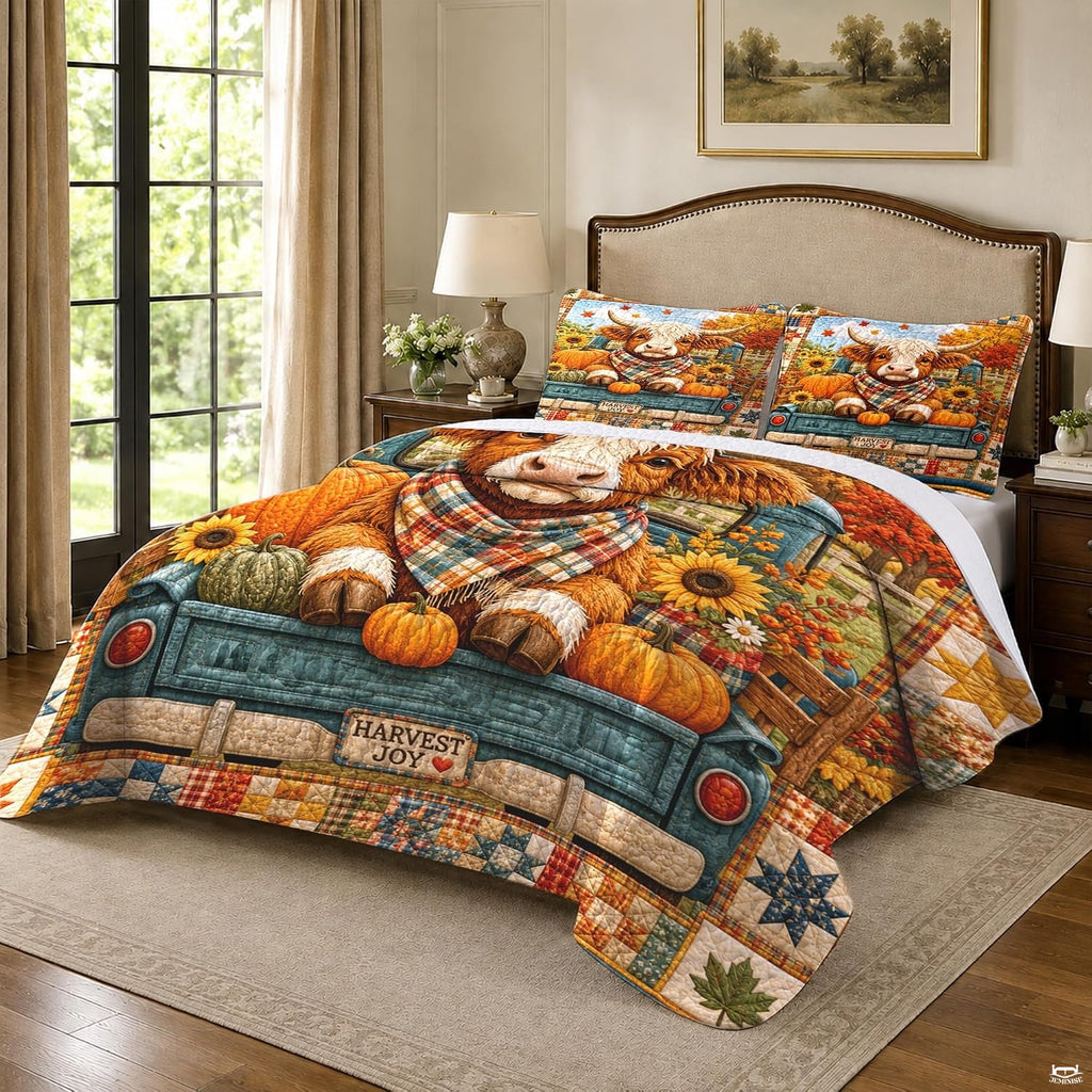Top-down view of Highland cow and teal truck autumn bedding set neatly arranged on a farmhouse mattress