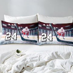 Side angle view of athletic winter sports bedding showing deep indigo violet and lilac tones on mattress