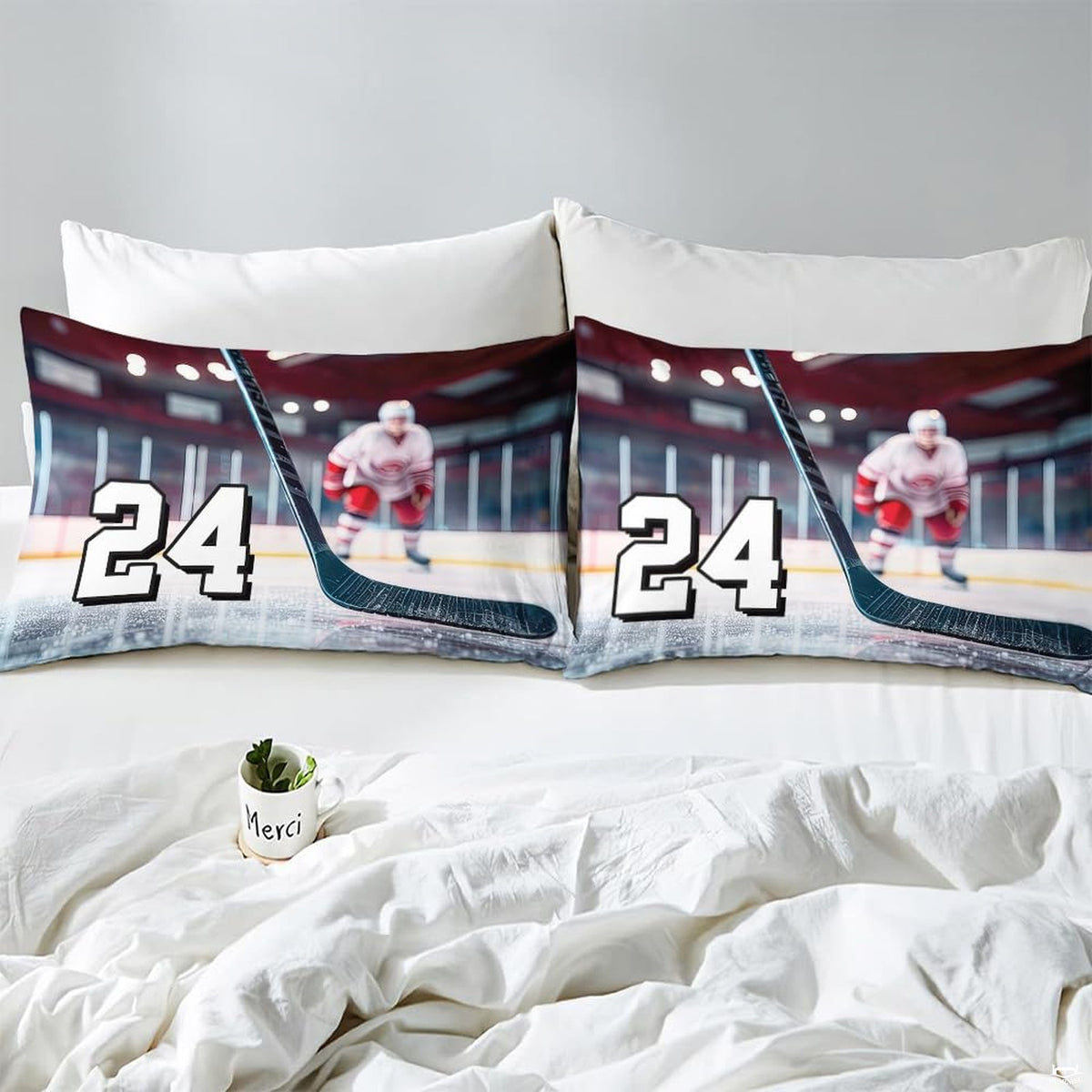 Side angle view of athletic winter sports bedding showing deep indigo violet and lilac tones on mattress