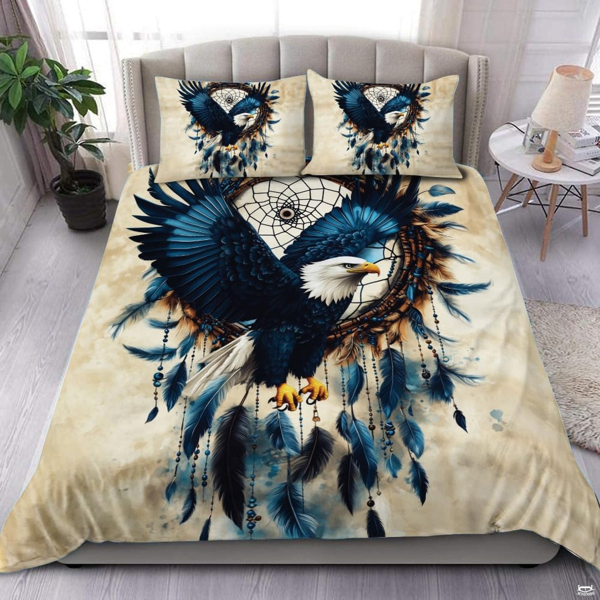 Southwestern native bald eagle feathers bedding set displayed neatly on a bed in a rustic lodge bedroom
