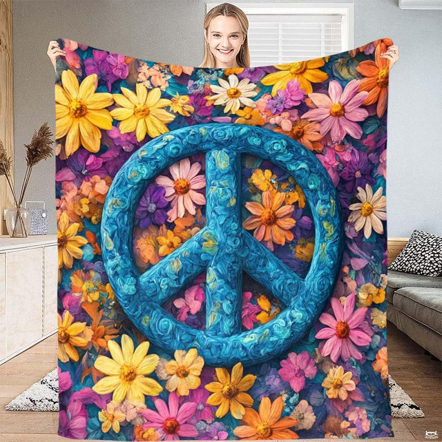Floral boho bedding set showcasing a swirling turquoise peace sign surrounded by colorful zinnia and daisy blooms.