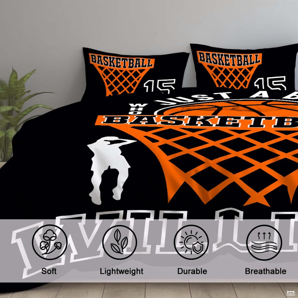 Corner fold view of basketball bedding highlighting vibrant orange printing against midnight black background
