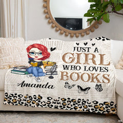 Folded view of reader girl throw blanket showcasing cheetah animal spots and book graphics.