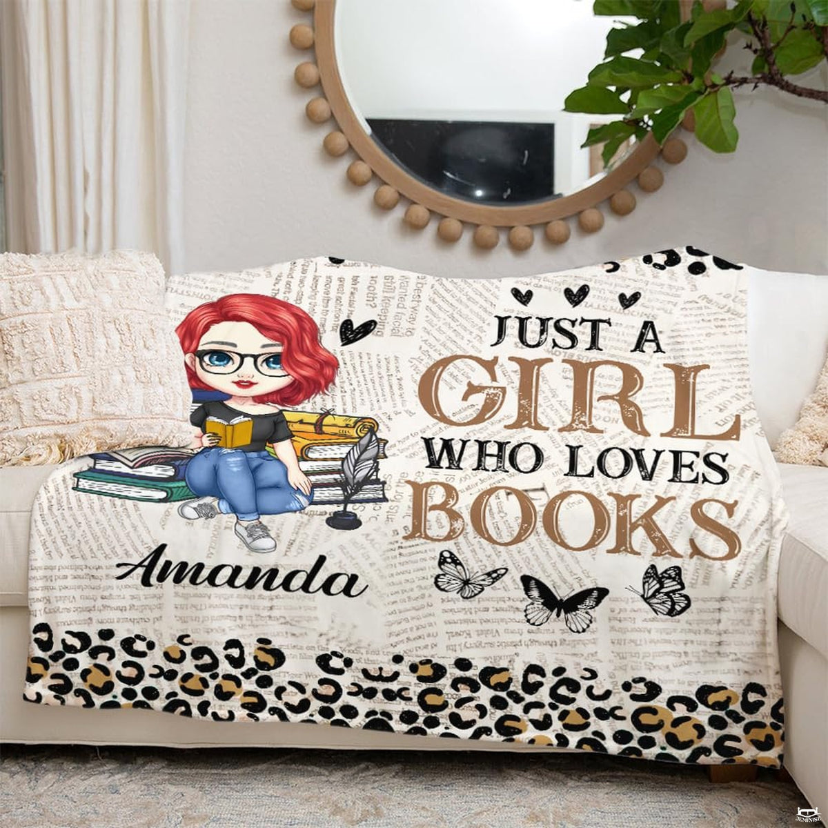 Folded view of reader girl throw blanket showcasing cheetah animal spots and book graphics.