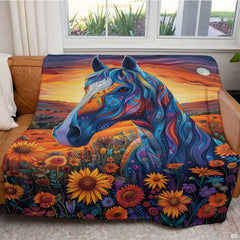 Bohemian living room setting featuring colorful blue horse sunflower blanket on gray couch