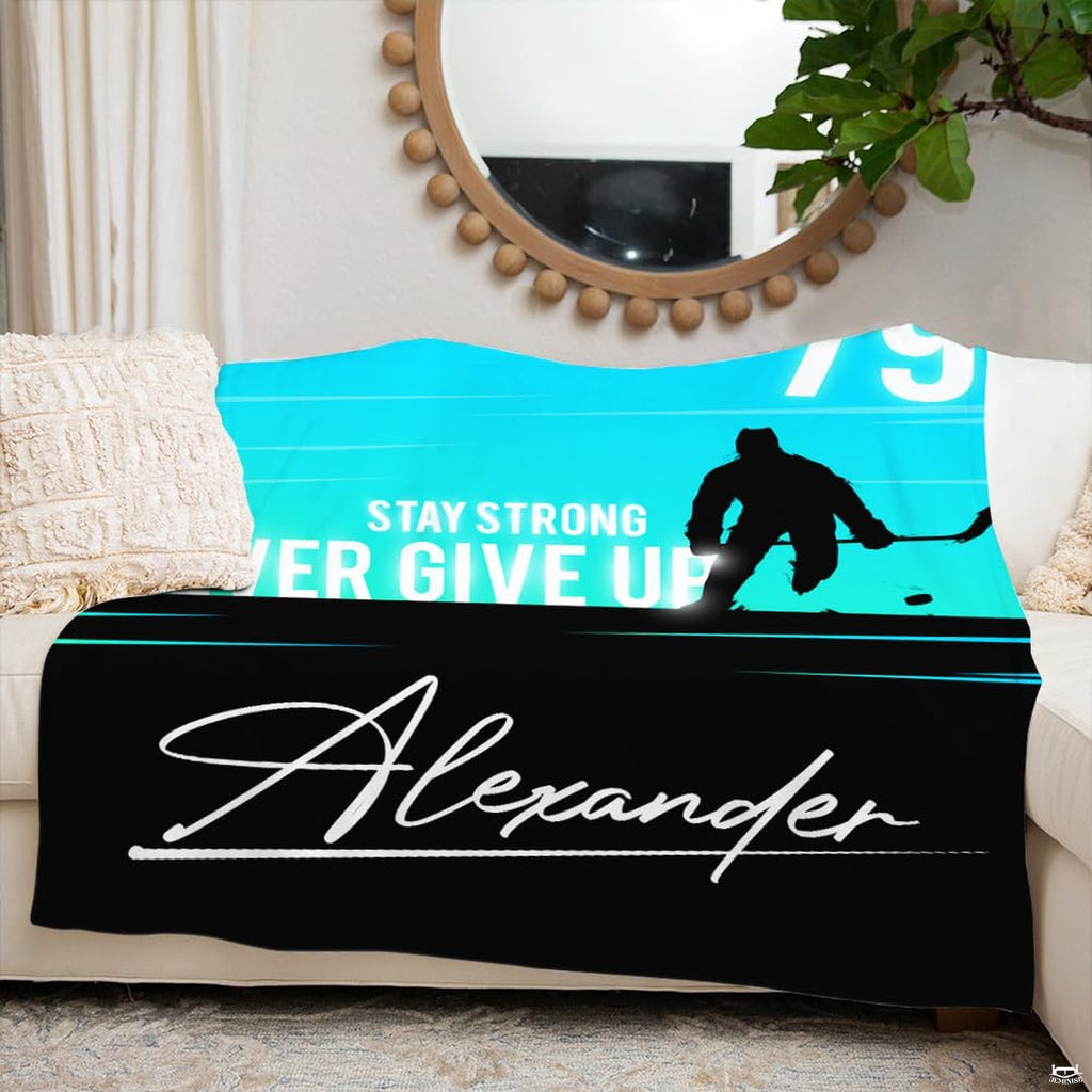 Contemporary sports bedroom arrangement highlighted by vibrant blue and black bedding.