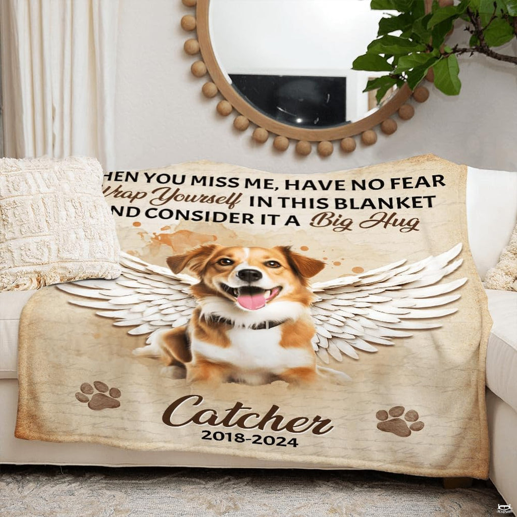 Dog memorial throw blanket spread neatly over a bedroom bed