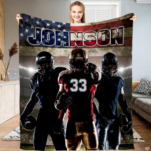 Patriotic football players American flag throw blanket displaying three athletes under lights beneath the US flag