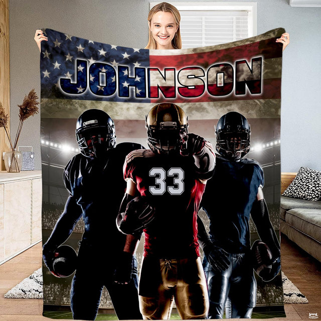 Patriotic football players American flag throw blanket displaying three athletes under lights beneath the US flag