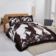 Overhead view of white Bigfoot American flag bedding arranged neatly across a rustic cabin mattress