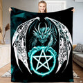 Gothic dragon throw blanket featuring an ice dragon with ornate filigree wings grasping a glowing cyan pentagram