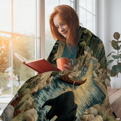 Mountain wilderness black bear throw blanket draped across living room sofa
