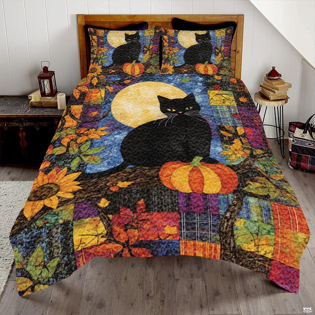 Autumn night black cat bedding featuring feline perched beside pumpkin under glowing moon on plaid patchwork