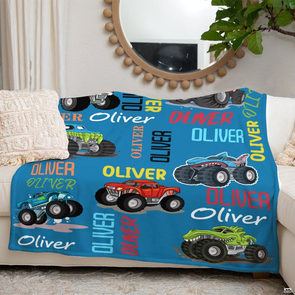 Full spread presentation of monster trucks throw blanket showcasing high-octane cartoon racing art